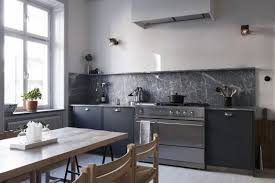Dark Grey Marble W Charcoal Cabinets Interesting Slab Tall Marble Back Splash W Matching Shelf At Top Modern Kitchen Kitchen Design Kitchen Inspirations