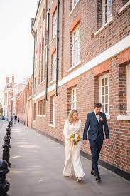 The list of great wedding locations in the uk is almost endless. This Bride Swapped Her Big White Wedding For An Intimate Town Hall Ceremony A Jumpsuit British Vogue