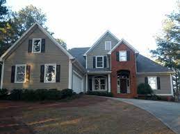 It looks hideous but i have. Brick Exterior Color Combo Black Shutters Red Brick House Exterior House Colors House Paint Exterior