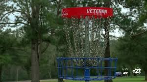 A golf disc is thrown from a tee area to a target which is the hole. Tom Brown Park Named In World S Top Disc Golf Courses List