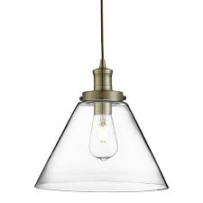 For a minimalist space, try a pendant with glass shades that won't take up visual space. Contemporary Antique Brass Pendant Light With Clear Tapered Glass