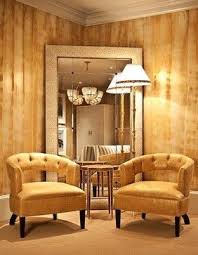 8 Ways To Fill Empty Corners Living Room Mirrors Corner Chair Living Room Living Room Chairs