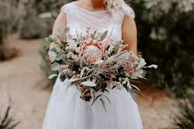 Wedding flower arrangements go beyond the basic centerpieces and bouquets. Artful Blooms Formerly Flowers By Ren Mornington Peninsula Florist