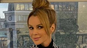 Amanda Holden plays dress up in her highest knee-high boots yet