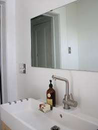 The one that remained was a basic plate glass mirror that was glued to the wall. How To Install A Big Frameless Mirror Without Adhesive Merrypad