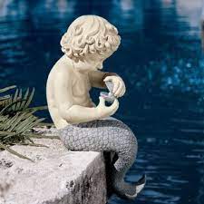 Regardless of wether you have a pond, a birdbath, or a large flower pot, this beautiful mermaid statue will make quite an impression. Resin Mermaid Statues Wayfair