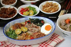 Masukkan beras,air, ayam dan daging serta bahan kisar ke dalam periuk nasi (rice cooker) dan garamkan.tekan butang 'cook'. Nasi Bubur Berlauk Ala Thai Resepi Terbaik