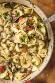 In italy, this soup is called tortellini en brodo, tortellini in broth, and is a snap to make after a long day at the office. Pesto Chicken Tortellini Soup Recipe Video The Cookie Rookie