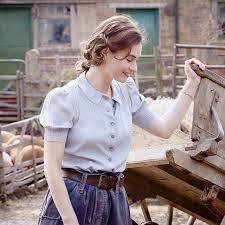 Lily James In The Guernsey Literary And Potato Peel Pie Society The Guernsey Literary Potato Peel Pie Society Potato Peel Society
