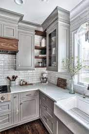 The above kitchen cabinetry is more modern using white shaker cabinets, while the kitchen image below is using custom veneer cabinetry with mirrored and glass insets. 950 Timeless Kitchen Ideas Kitchen Inspirations Kitchen Design Kitchen Remodel
