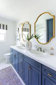 Brighten up your bathroom or add an accent piece above the bookshelf with this modern vanity mirror. Blue And Gold Bathroom Decor Novocom Top