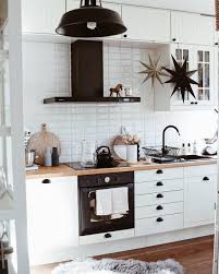 white cabinets black countertops