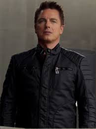John barrowman has confirmed that he will be returning to arrow before the end of the series' seventh season. Arrow Malcolm Merlyn Leather Jacket