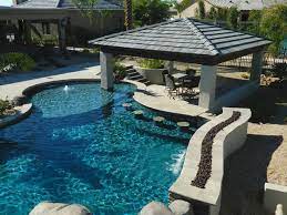 A blacksmith and an artisan, miran specializes in sophisticated design, making unique wrought iron sculptures, staircase railings, fences and gates, wrought iron furniture, gazebos and balconies. Lazy River Pool Swim Up Bar In Arizona Mediterranean Pool Phoenix By Unique Landscapes And Custom Pools Houzz Au