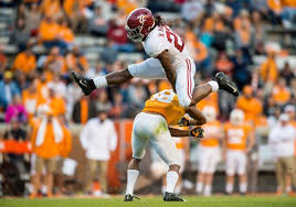 Alabama Crimson Tide Running Back Najee Harris 22 Hurdles Tennessee Volunteers Defensive Back Nigel Alabama Football Roll Tide Football College Football News