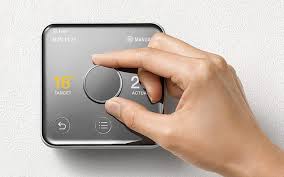 This box will keep your desired temperature settings on your thermostat away from noisy fingers who would like to change it. Yves Behar S Latest Smart Thermostat Looks Like A Small Steel Box Homecrux