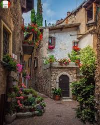 Borghi assali has recently started an industrial investment with the support of the emilia romagna region. A Colorful Alleyway In Borghi Italy Beautiful Places Italy Village Photos