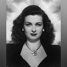 Bib necklace of sapphires, diamonds, & 18kt gold. Gouache