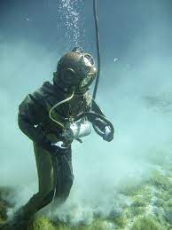 After you put the fuel in, click the equip diving suit button. Person In Green Scuba Diving Suit Free Stock Photo