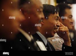 Andrew Poon Principal of Sutro Elementary School (second from right)  listens to speakers with others during a roundtable discussion with U.S.  Secretary of Education Arne Duncan hosted by Mayor Ed Lee, Treasurer