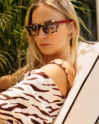 Hello!? Did somebody call me a (party) animal? @Prada tortoise shell shades  by virtue of @sunglasshut, ofcourse. #FaceTheSun #NFAlignment