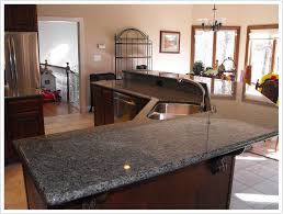 How do dark countertops look with stainless. New Caledonia Granite Bath Granite Denver