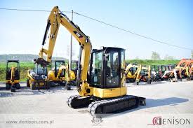 Mini excavator from france 3 buckets included excellent condition. Caterpillar 305 E Cr 2013