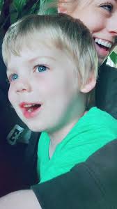 Little Boy Singing with Mom in A Truck