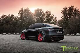 If you thought the tesla model x was already too expensive in… tesla model x black satin gold dust vinyl wrap with carbon fiber accents on chrome and all 6 seat backs. Custom Satin Black Tesla Model X With Mx114 22 Inch Forged Wheels In Imperial Red By T Sportline Tesla Model X Tesla Model Tesla