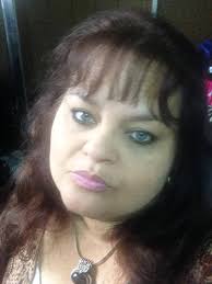 TRACY ALONZO DEDICATES ONE OF HER PAINTINGS IN MEMORY OF ANGELO  BISSESSARSINGH. ## STORIES FROM THE FIELD Tracey Alonzo, who is an avid  photographer, painter, and illustrator recently had four pieces