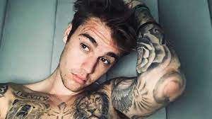 Bieber has over sixty tattoos as of october 2020. See Justin Bieber S New Forever Neck Tattoo Youtube