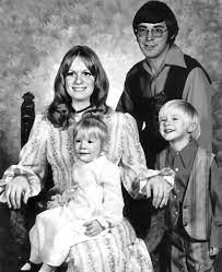 Brighter - In 1974, a family portrait captured a rare and intimate glimpse into the early life of Kurt Cobain, the future grunge icon and frontman of Nirvana. Taken in a photography
