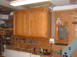 If you enjoy diy projects, you can laminate your kitchen cabinets. My Woodshop Storage Ideas Recycling Kitchen Cabinets Into Garage Storage Units Dengarden