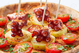 Pulpo gallego is a grilled octopus that's a traditional tapa from galicia, served all over spain today. Galician Octopus A La Gallega Tapas Pinchos Recipe From Spain With Potatoes Stock Photo Picture And Royalty Free Image Image 73298917