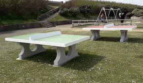 The game takes place on a hard table divided by a net. Two Brand New Outdoor Table Tennis Tables At The Salts