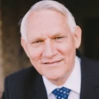 Dr James A Robertson