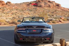 Image result for Midnight Blue 2010 Aston Martin
