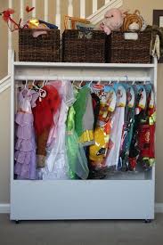 This Looks Very Pretty But Not Very Practical I Would Modify This So That Even A Very Young Kid Could Clean Up Dress Up Storage Storage Bins Kids Dress Up