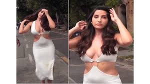 Nora Fatehi look hot in white bodycon dress with plunging neckline