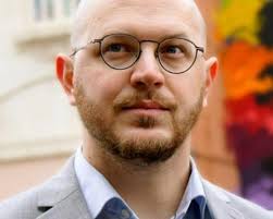 Pasha Baker (Two Broads Talking Politics podcast)