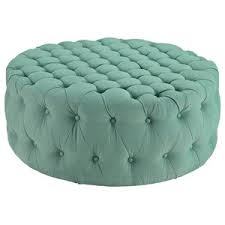 The medium firm cushion is fully upholstered creating a sturdy surface to place a tray with drinks or a comfy spot to put your feet up at the end of the day. Pulaski Round Button Tufted Cocktail Ottoman With Casters In Brown Transitional Footstools And Ottomans By Homesquare Houzz