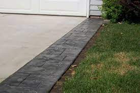 Backfill the area between the landscape edging and the lawn with. Pin By Lynda Delgross On For The Home Stamped Concrete Driveway Driveway Design Driveway Landscape