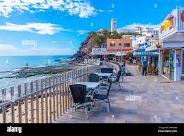 Morro Jable, Spain, Janury 24, 2021: People are strolling on a promenade at  Morro Jable, Fuerteventura, Canary islands, Spain Stock Photo - Alamy