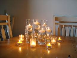 Vvery Simple Centerpieces They Re Actually Glasses That I Purchased At Ikea And Wi Simple Candle Centerpieces Candle Centerpieces Floating Candle Centerpieces