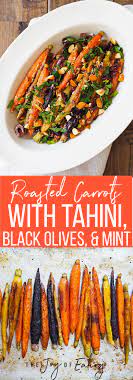 Roasted Carrots With Tahini Black Olives And Mint It S An Easy Side Dish That S Packed Wi Side Dish Recipes Healthy Roasted Carrots Healthy Vegetable Recipes