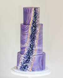 Bride holding big wedding bouquet. Wedding Cakes Blue Lace Cakes