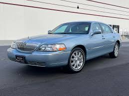 Image result for Light Ice Blue 2006 Town Car