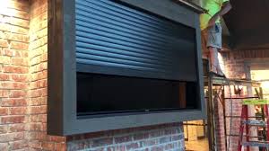 In this case, that means the boards overlap each other by about an inch. Outdoor Tv Enclosure Tv Shutter Shield Roll A Shield