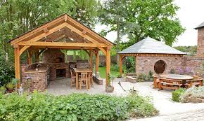 Covered outdoor kitchen made out of wood. Outdoor Kitchen Designer In Cheshire South Manchester Wirral