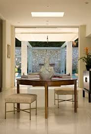 Elizabeth Dinkel Design Entrances Foyers Round Walnut Foyer Table Brushed Nickel Modern Stools Gray Dam Modern Entry Table Foyer Design Modern Entry